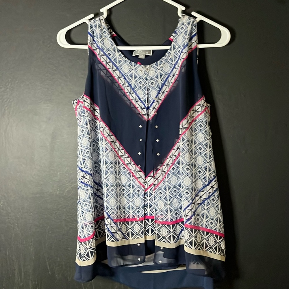 Ladies top blue and whitete with pink accents.